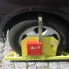 Technický prostředek k zabránění odjezdu vozidla T-CAR (botička)